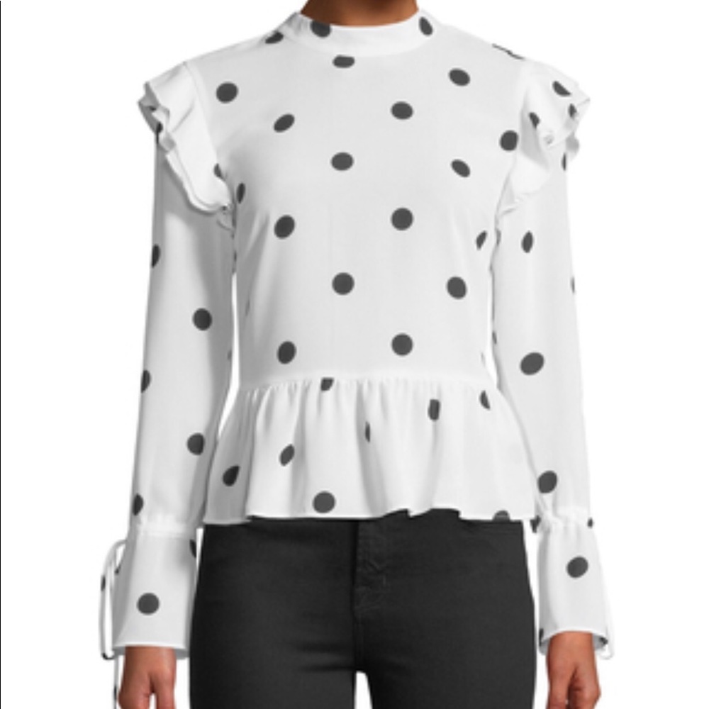 Polka dot blouse.